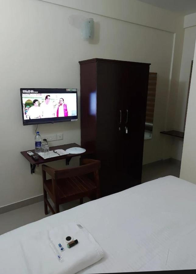 Masterkey Deluxe Rooms Kochi Esterno foto